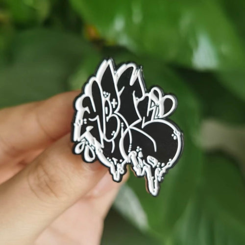 Yellow Kepts graffiti pin